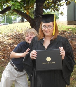 A picture of the graduate, and her little brother on Being Peachy epic asshattedness