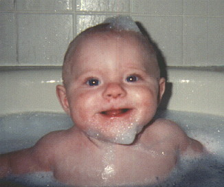 baby in a bath tub