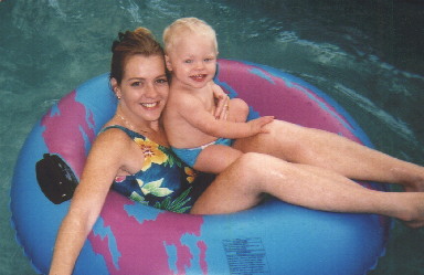 mom and baby in lazy river