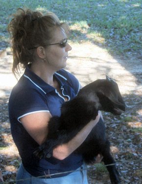 sandi thepeachy1 holding a goat